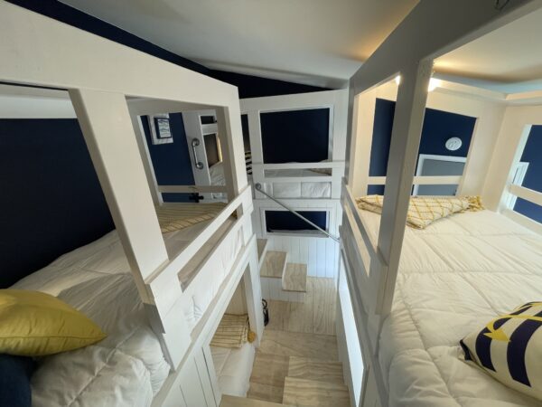 Double decker white beds closeup shot